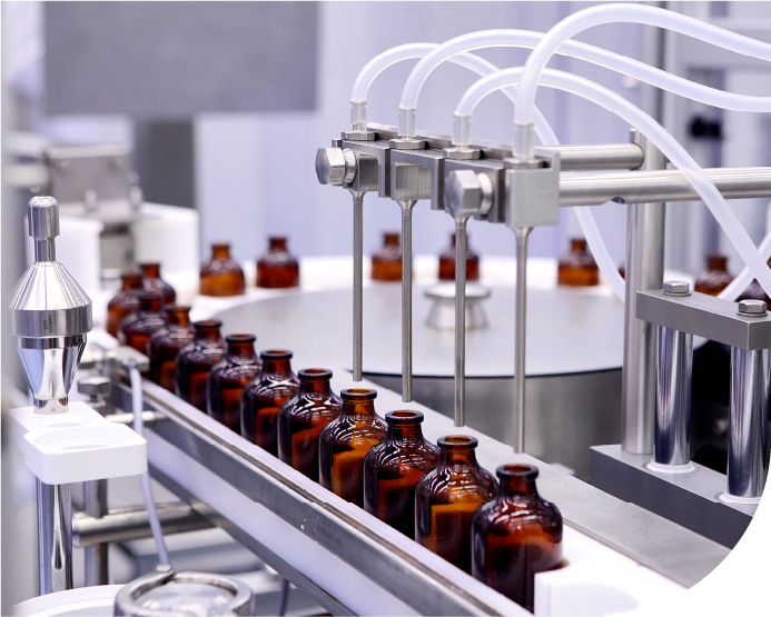 factory droppers fill Carow Packaging bottles